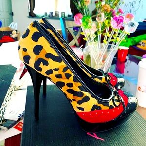 Leopard print wingtip pumps